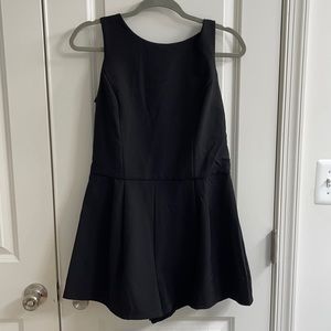 Black Romper With Flowy Back